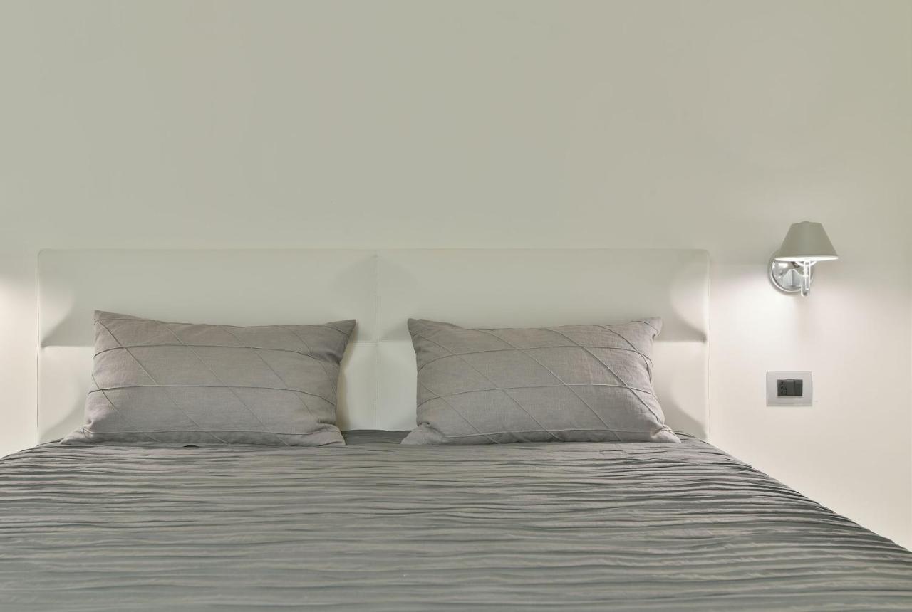Tolomeo Rooms Laura Bagian luar foto