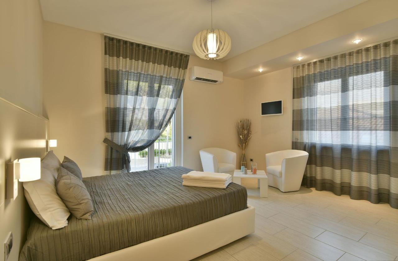 Tolomeo Rooms Laura Bagian luar foto