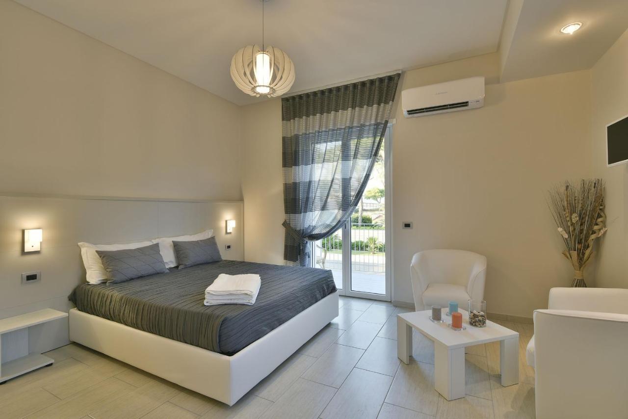 Tolomeo Rooms Laura Bagian luar foto